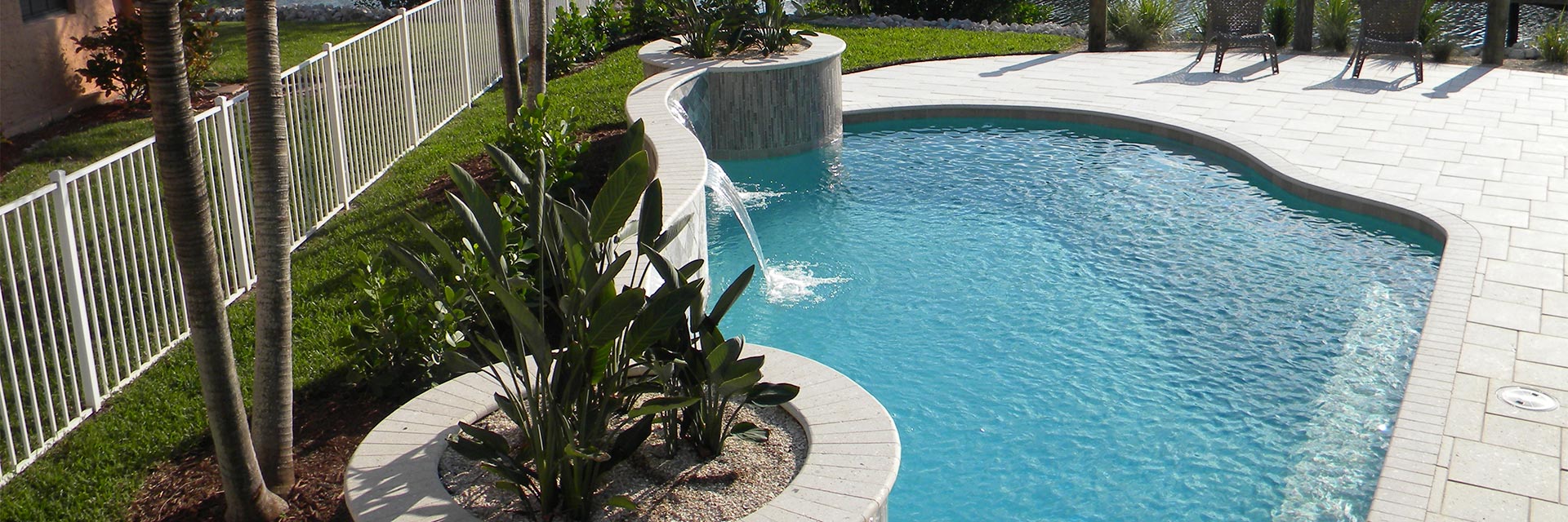 sparkling clean pool with water feature